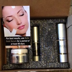 Set of Bella Gold cosmetics: face cream, eye revitalizer, age defying serum.